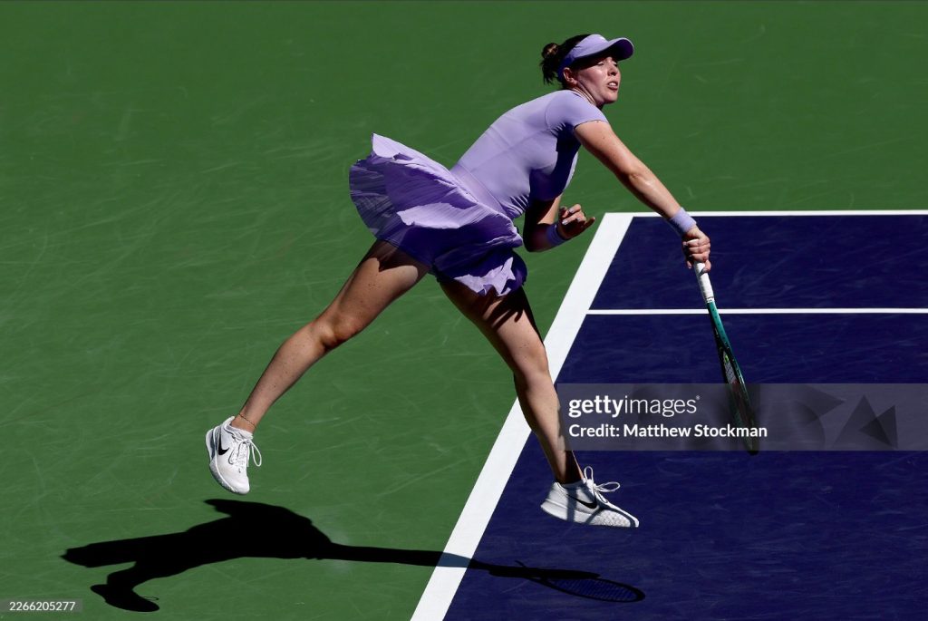 A photo from Getty Images with Talia Gibson serving in her Indian Wells quarterfinal match.
